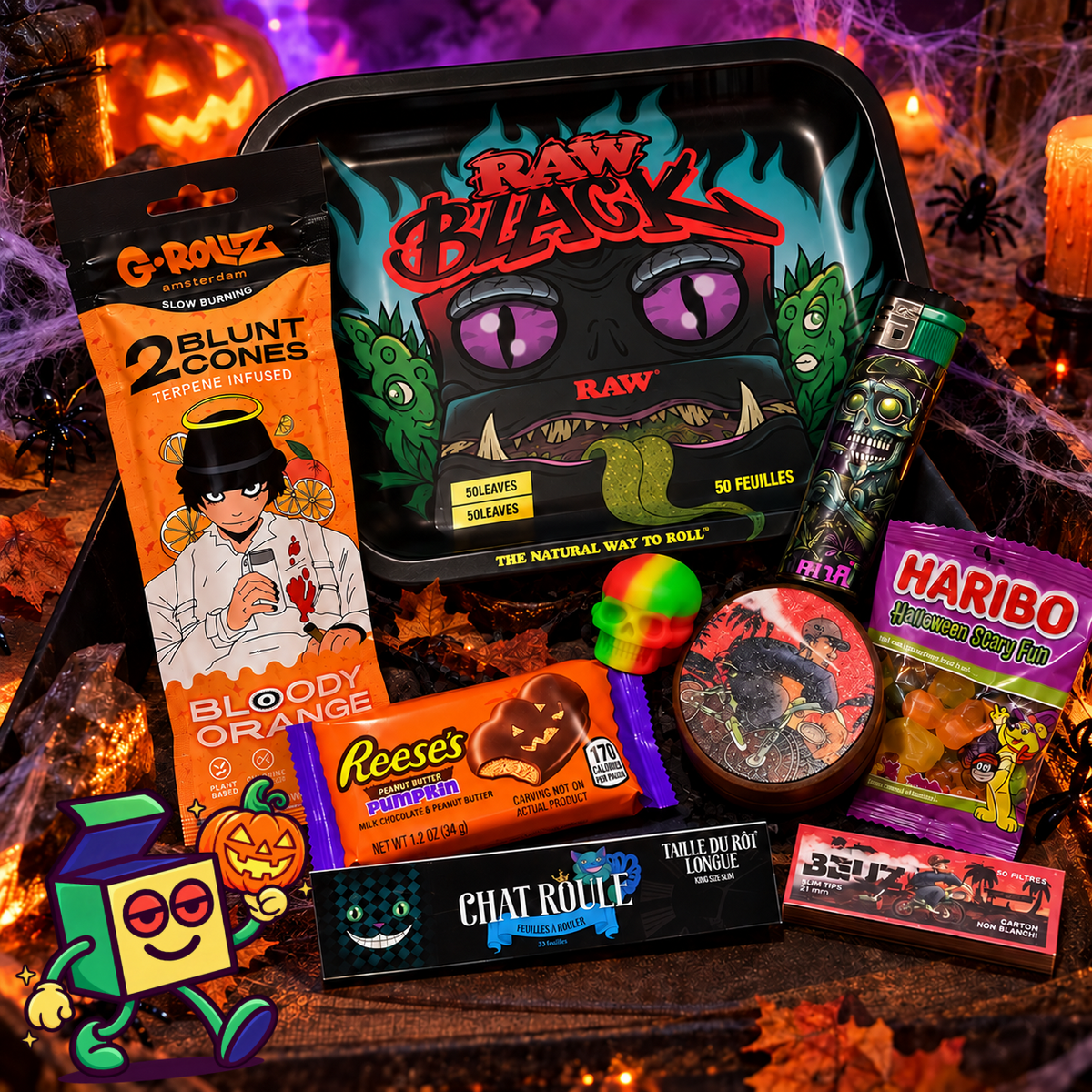 Smoke Box Halloween 2026 : découvrez la Spooky Box et ses accessoires sur le thème d’Halloween. Un plateau RAW Black Monster, un briquet zombie, un grinder Beuz, des feuilles à rouler, des filtres, des blunts G-Rollz, des confiseries Reese’s et Haribo, ainsi que plusieurs accessoires réunis dans une composition festive aux couleurs d’Halloween.